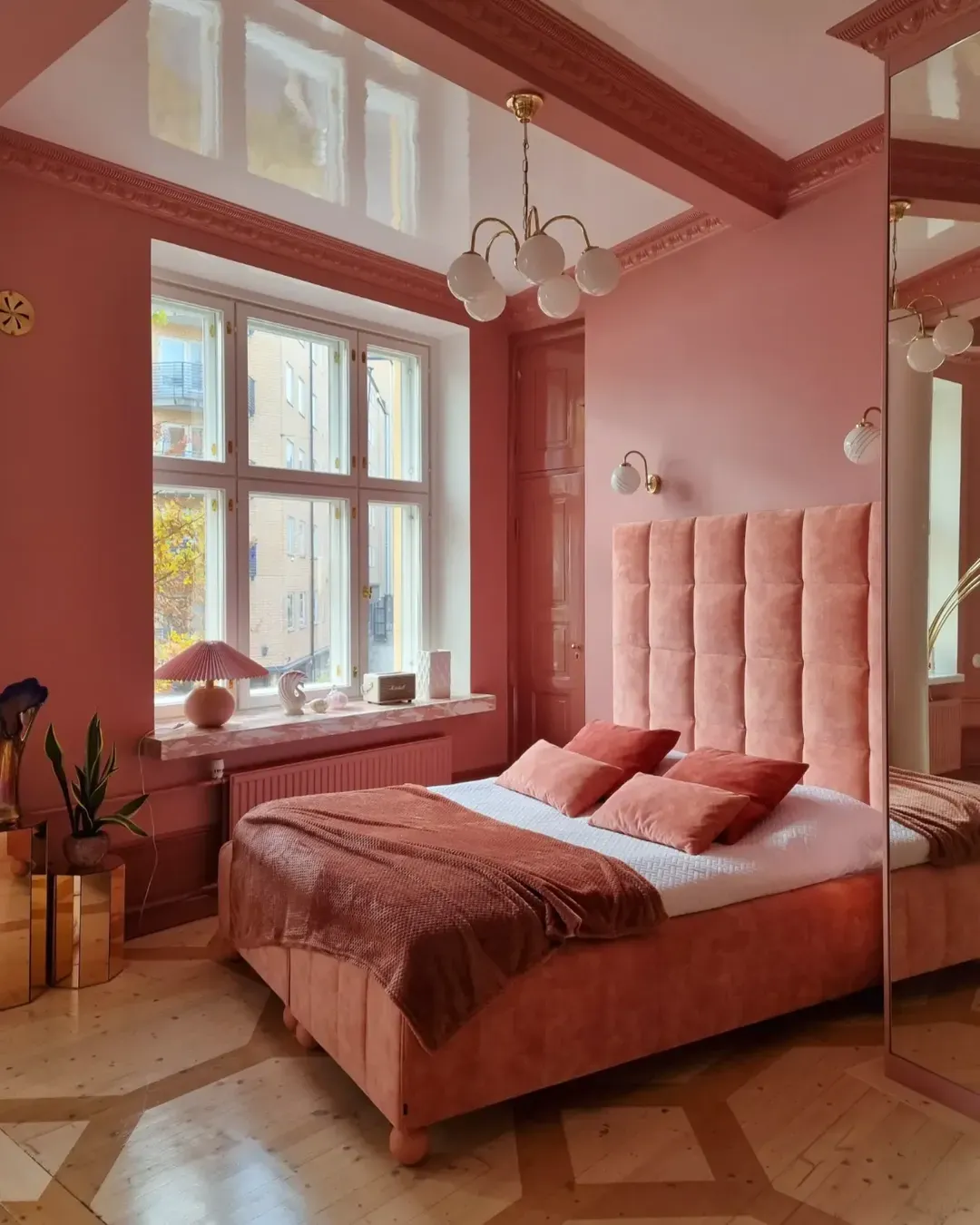colourful bedroom with IKEA bed and painted legs for a bold interior look