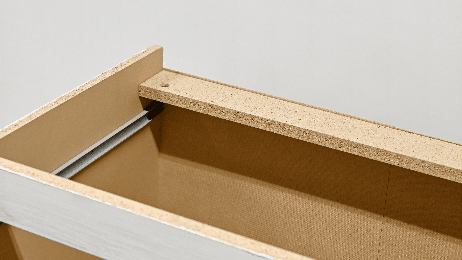 IKEA MALM dresser underside without support showing why legs cannot be attached directly